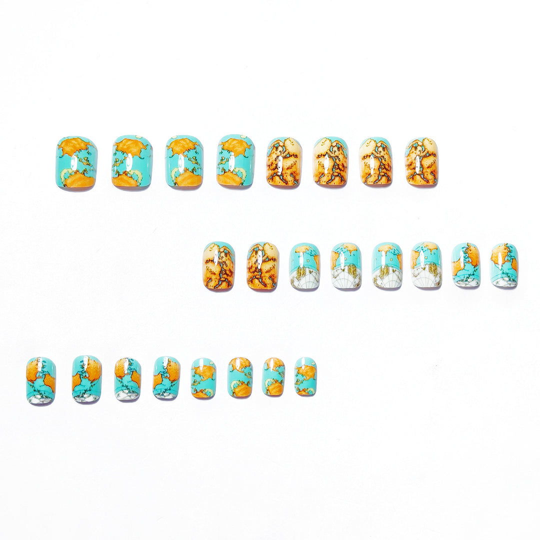 Creative artificial nails with world map inspired design Stornfield