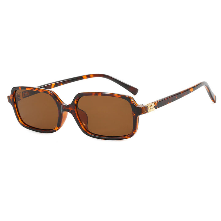Ladies fashionable sunglasses with elegant plastic frame and elaborate design Stornfield