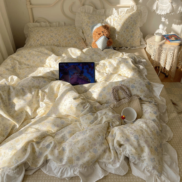 Romantic cotton satin bedding set with ruffled frills and fine floral pattern