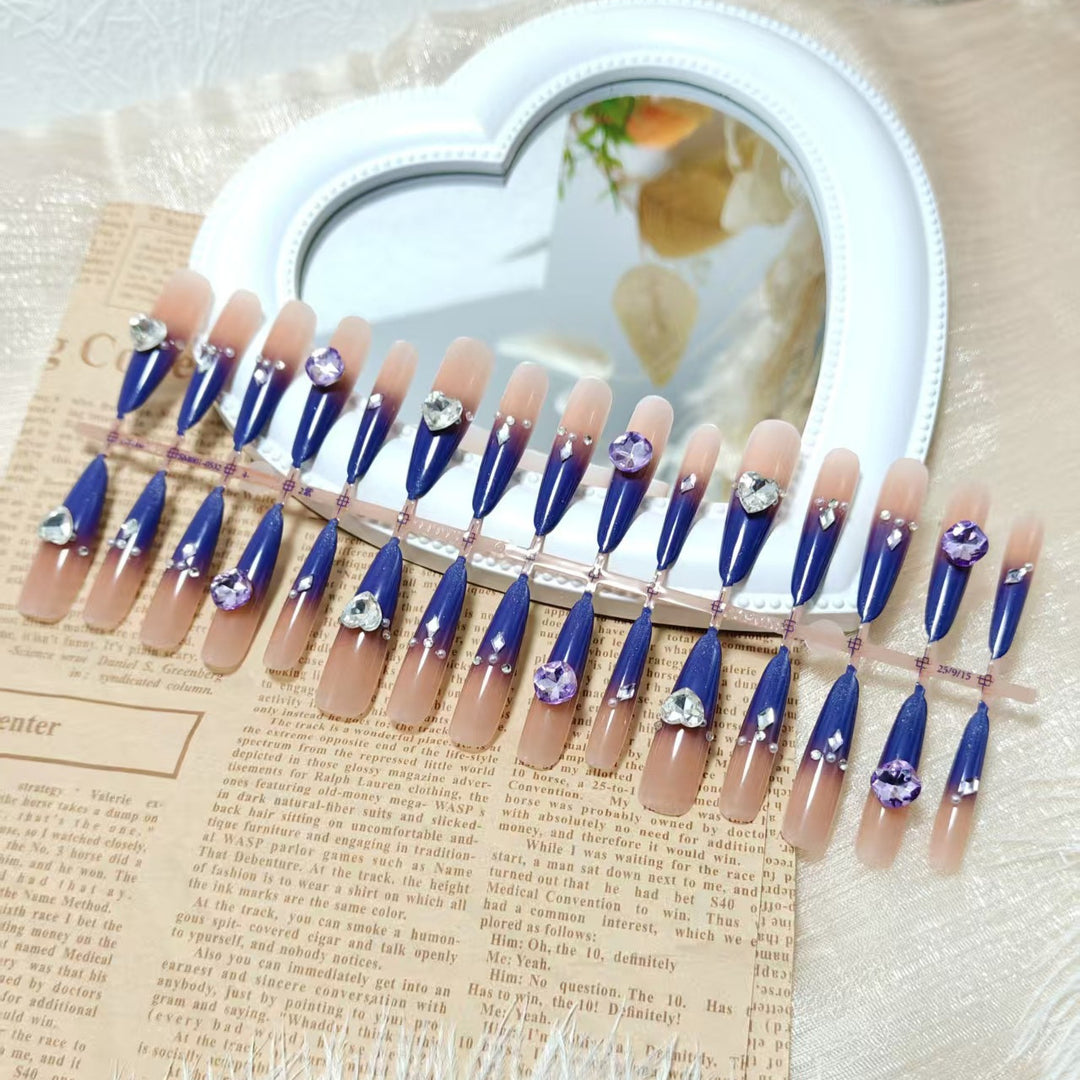 Artificial nails with elegant glitter design and 3D rhinestone accents Stornfield
