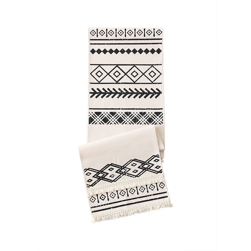 Woven table runner in Boho style with fringes and geometric ethnic print Stornfield