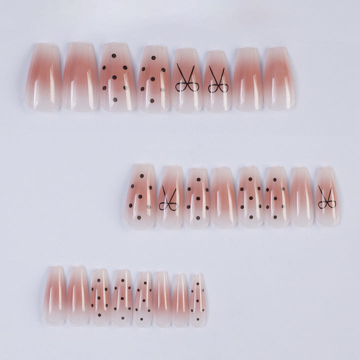 Artificial nails with modern dot design and elegant accents Stornfield