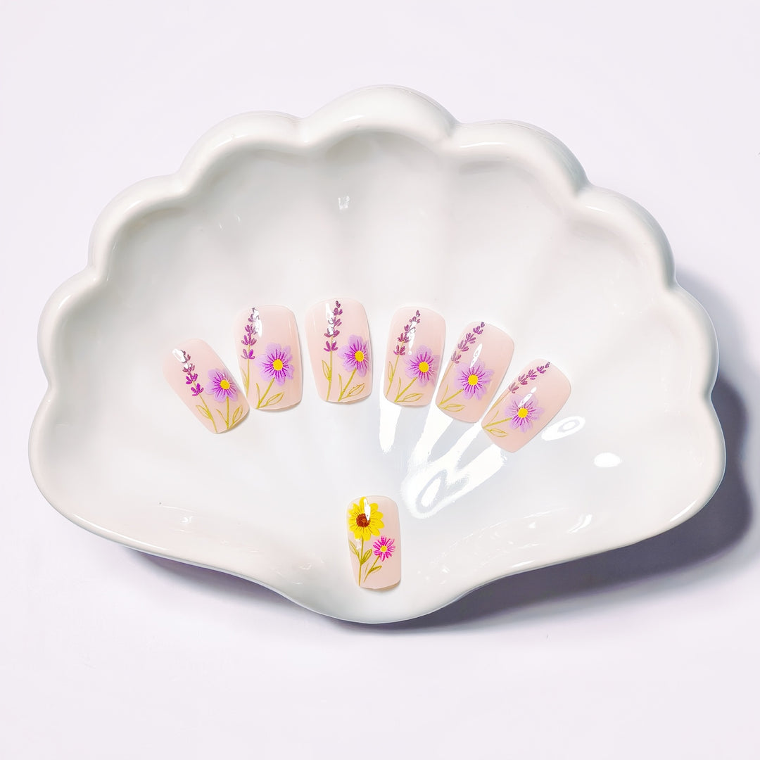 Glittering artificial nails with floral patterns Stornfield