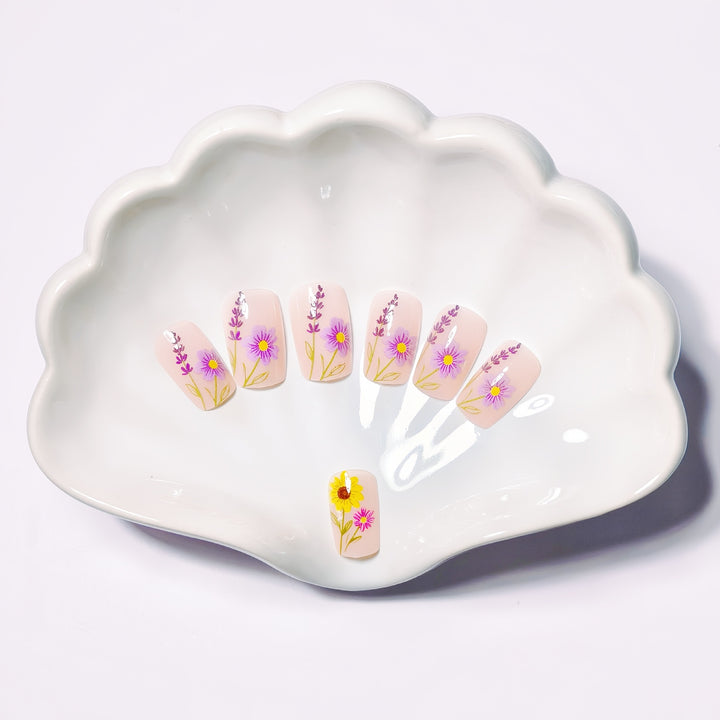 Glittering artificial nails with floral patterns Stornfield