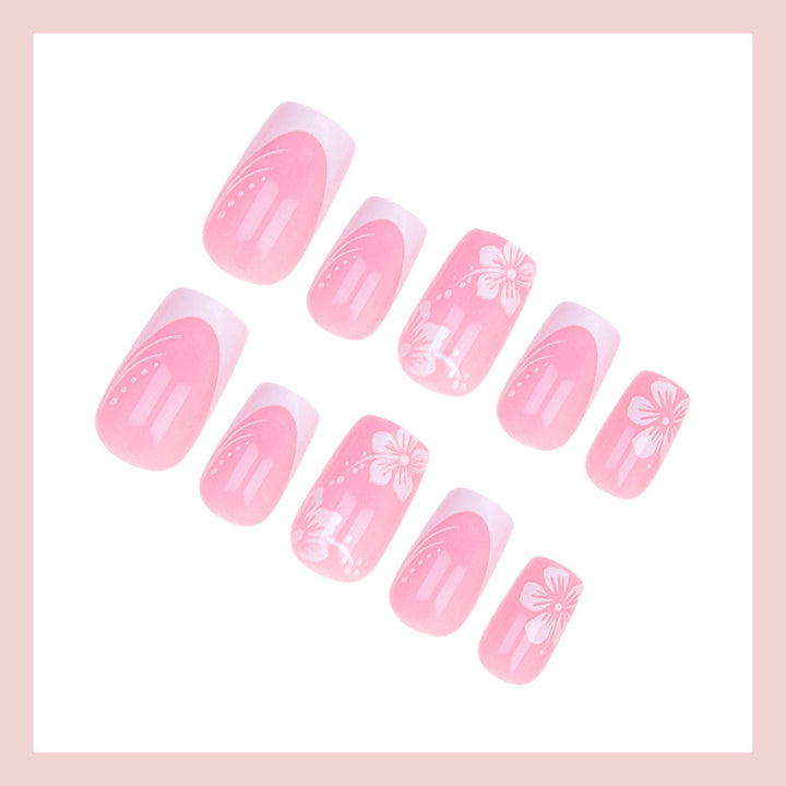 Artificial nail set with elegant French design and delicate flower patterns Stornfield