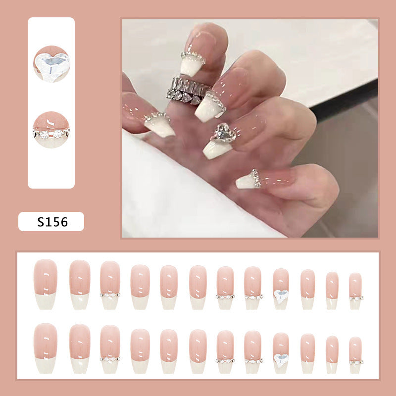 Glamorous artificial nails with rhinestones and elegant contours Stornfield