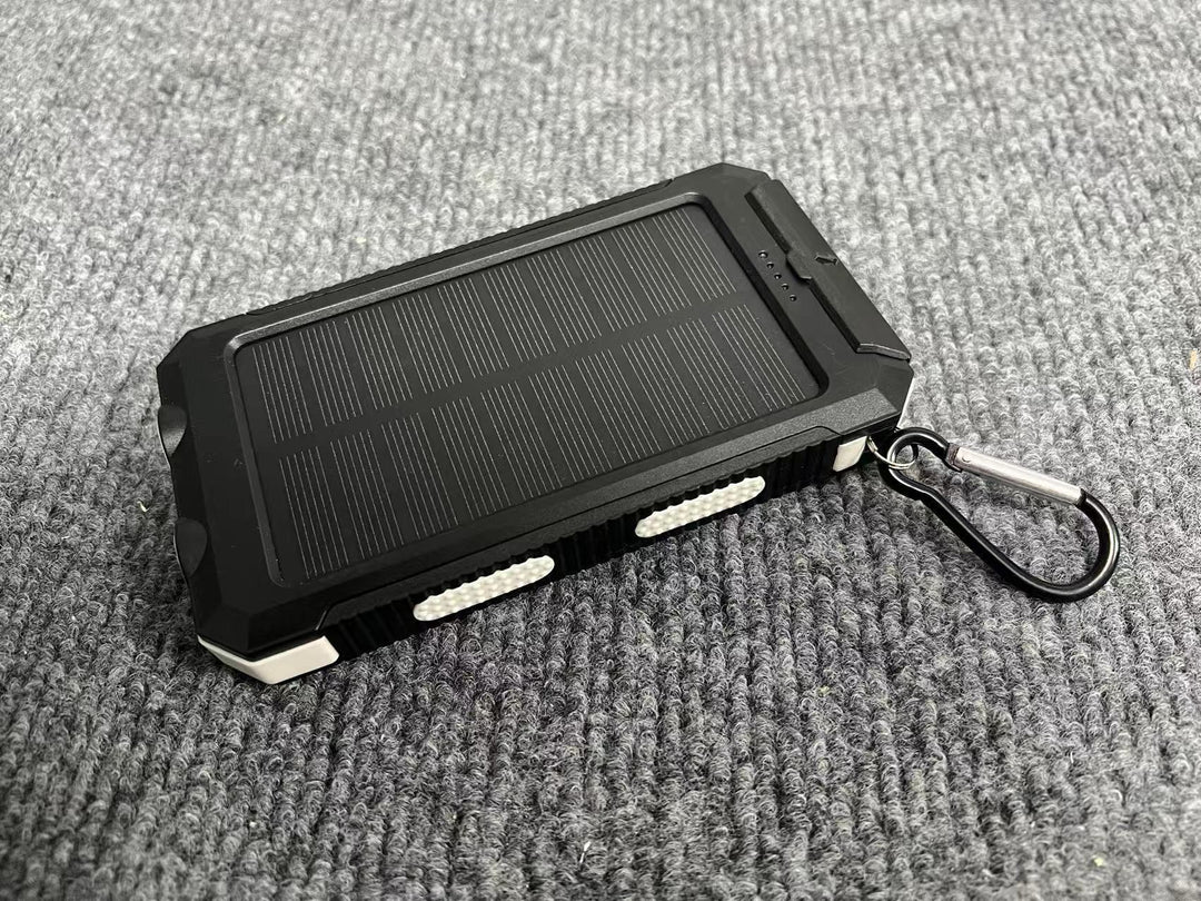 Portable solar power bank with integrated charging plug function Stornfield