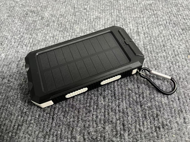 Portable solar power bank with integrated charging plug function Stornfield