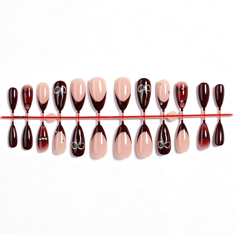 Creative nail art set with elaborate two-tone effect and elegant embellishments Stornfield