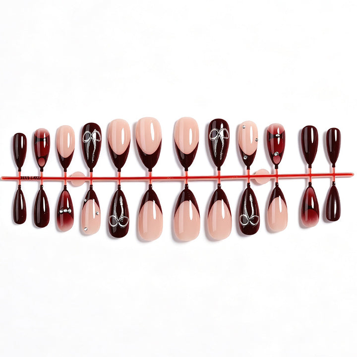 Creative nail art set with elaborate two-tone effect and elegant embellishments Stornfield