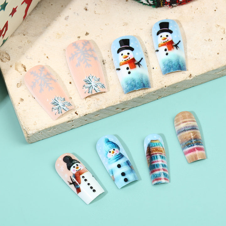 Festive artificial nails with snowman motif Stornfield