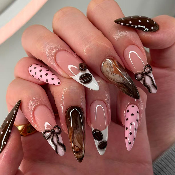 Elegant artificial nails with chocolate motifs and 3D elements Stornfield