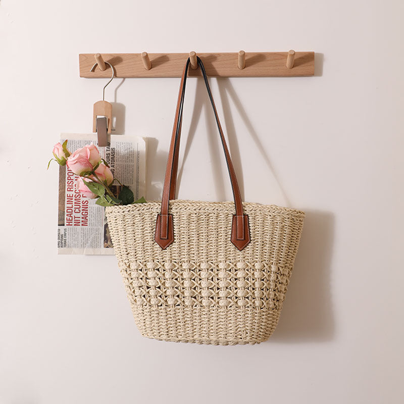Handcrafted rattan basket bag with elegant leather accents Stornfield