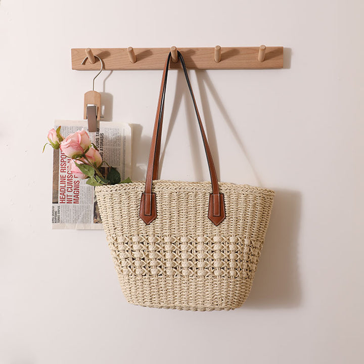 Handcrafted rattan basket bag with elegant leather accents Stornfield