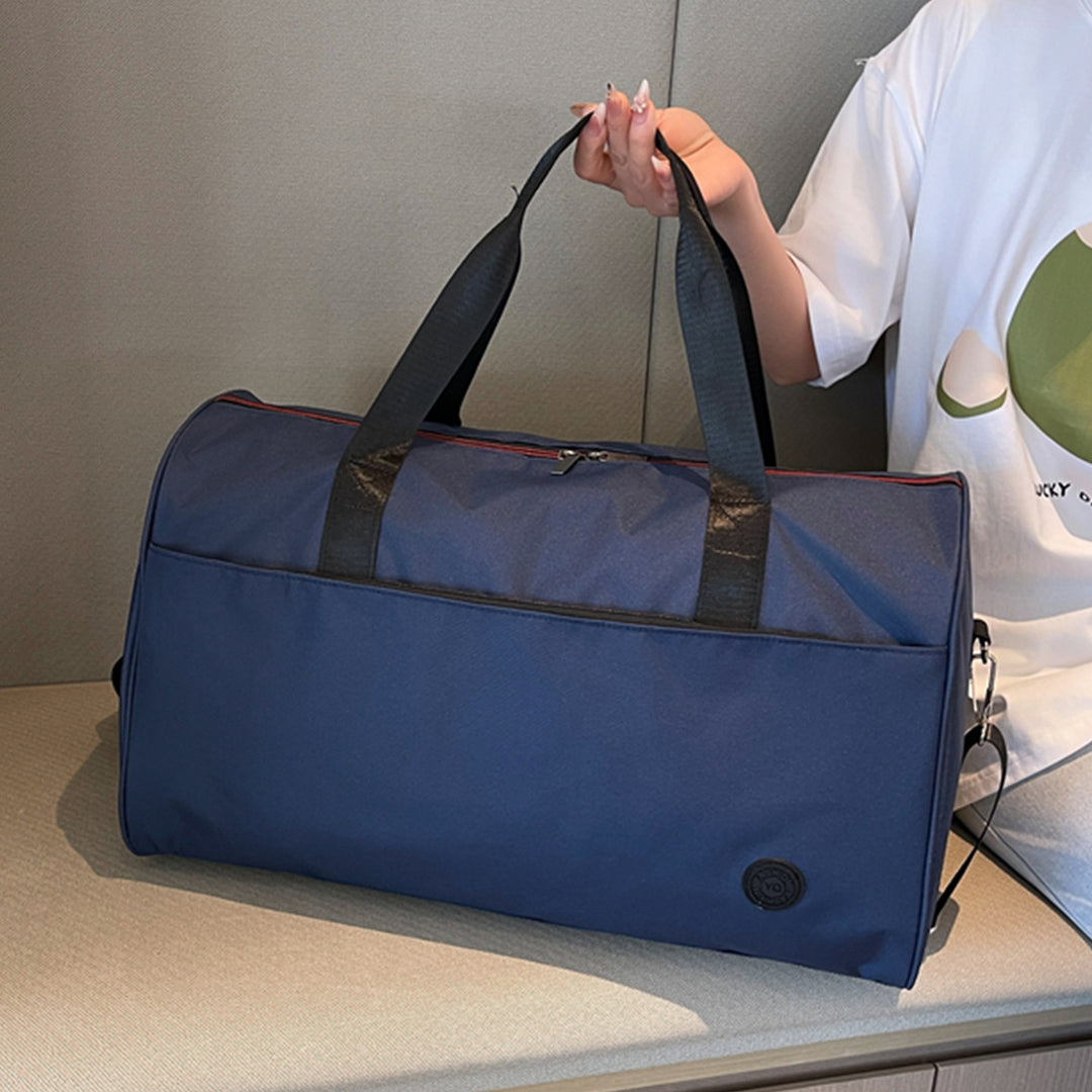 Sporty travel bag with sturdy carrying handles and removable shoulder strap Stornfield