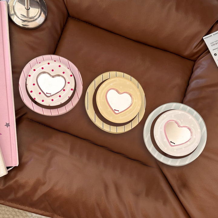 Heart-shaped coaster with playful design Stornfield
