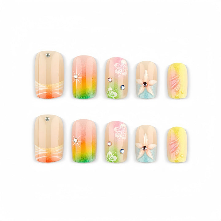 Acrylic nails with floral accents and gradient Stornfield