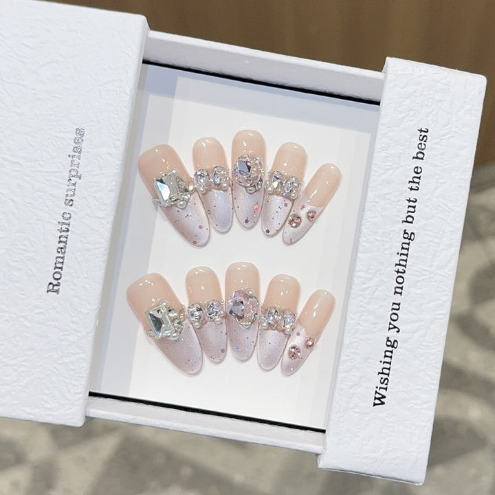 Romantic artificial nails with glitter decoration Stornfield
