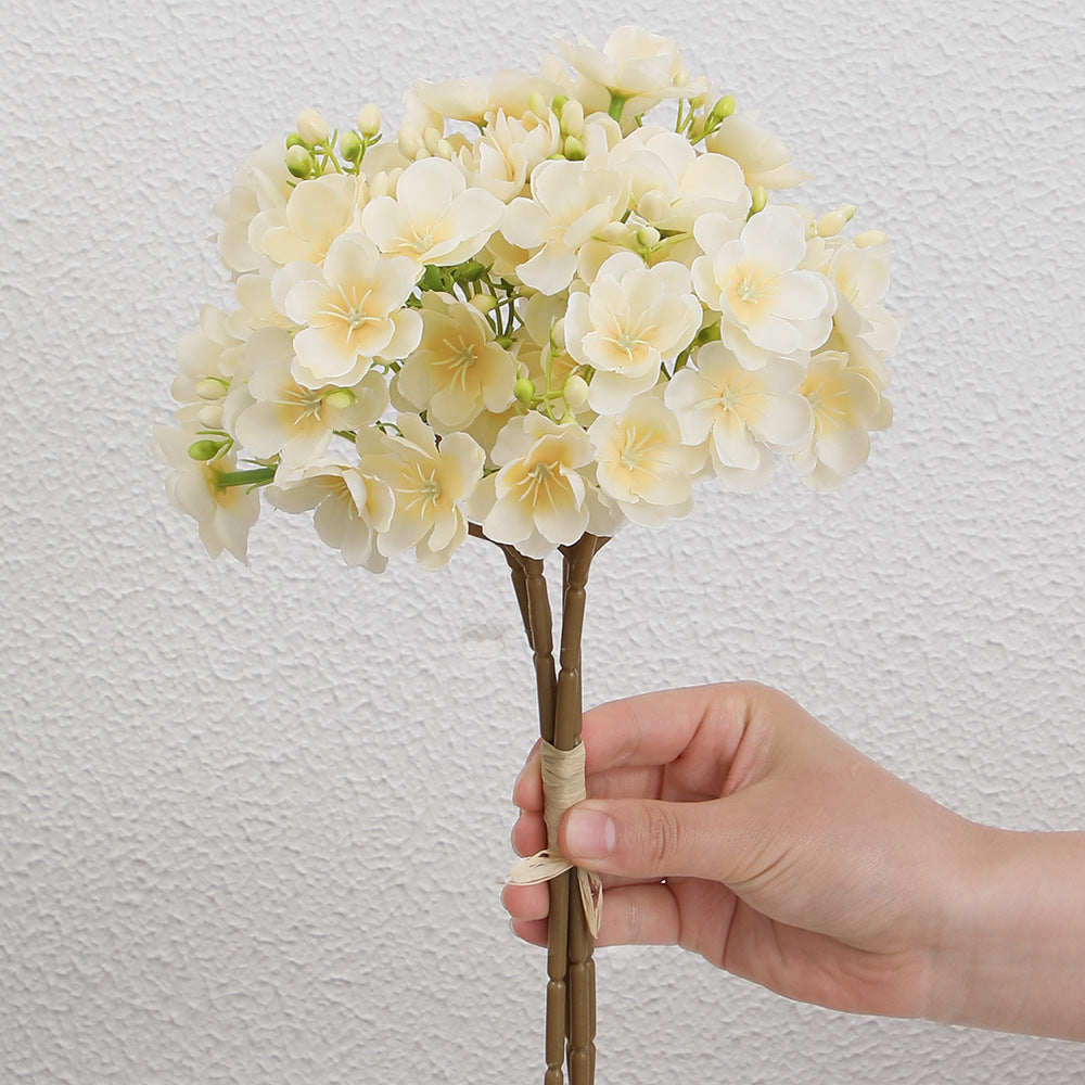Artificial flower bouquet with delicate blooms