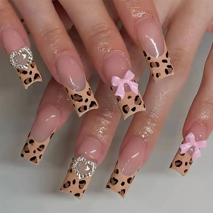 Artificial nail set with delicate bow and leopard patterns Stornfield