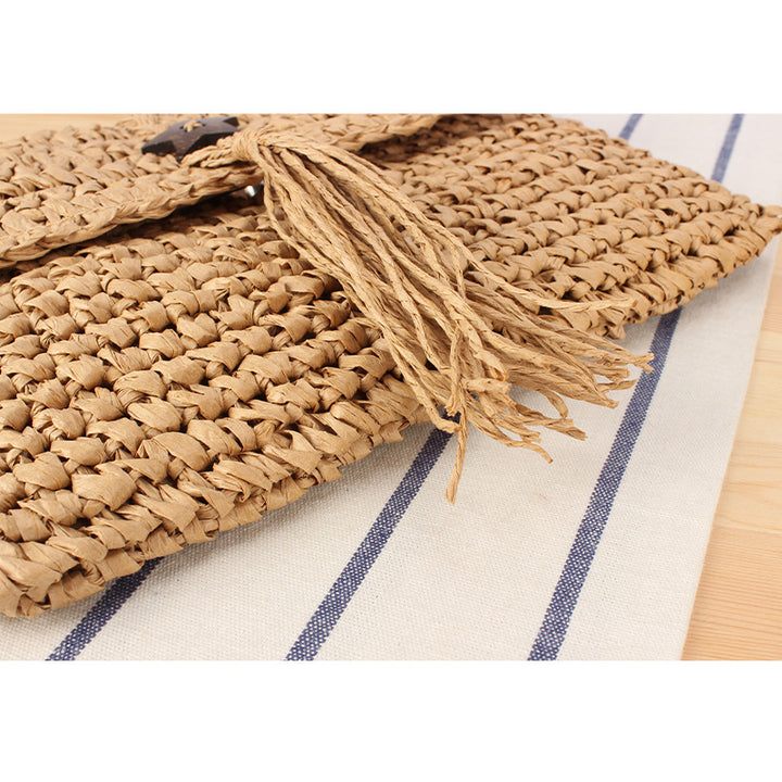 Handmade macrame shoulder bag with tassels and leather accents Stornfield