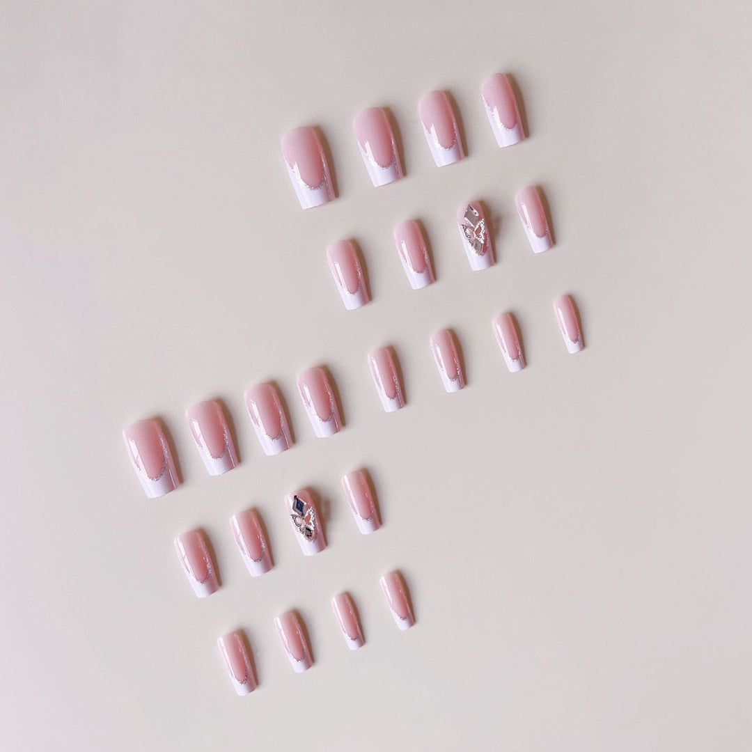 Acrylic nail set with elegant rhinestone and modern tip decorations Stornfield