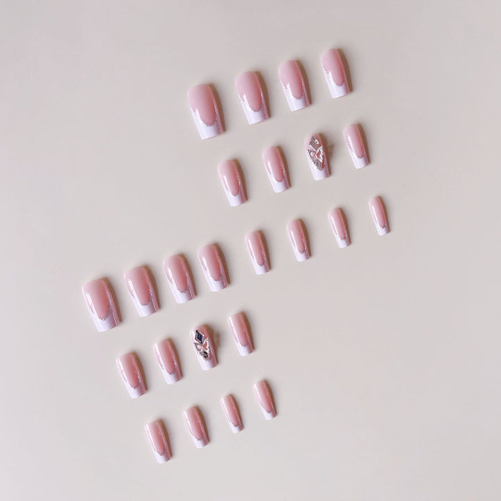 Acrylic nail set with elegant rhinestone and modern tip decorations Stornfield