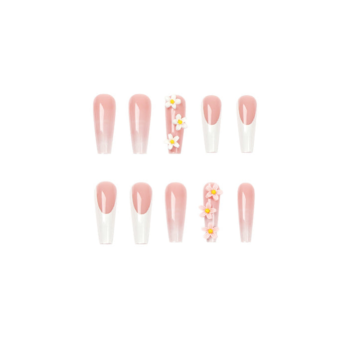 Artful nail extensions with elegant gradient and creative floral accents Stornfield
