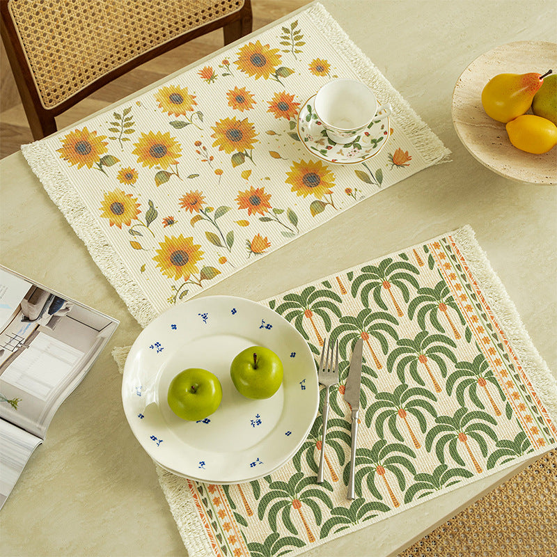 Rectangular woven rug in tropical palm pattern with flat weave and fringes