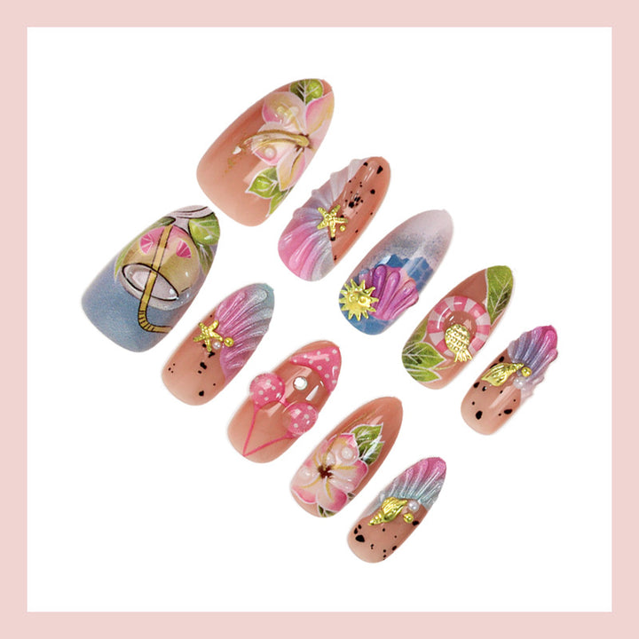 Artificial nail set with botanical designs and glamorous accents Stornfield