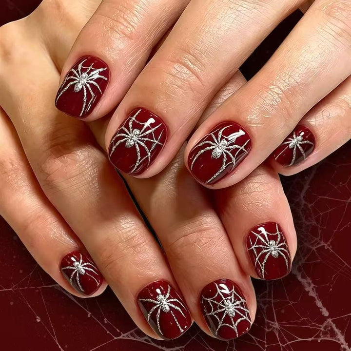 Acrylic nail set with spooky spider and glitter accents Stornfield