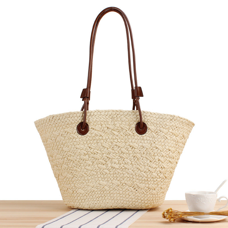 Beach bag made of high-quality braided straw with stylish leather handles Stornfield