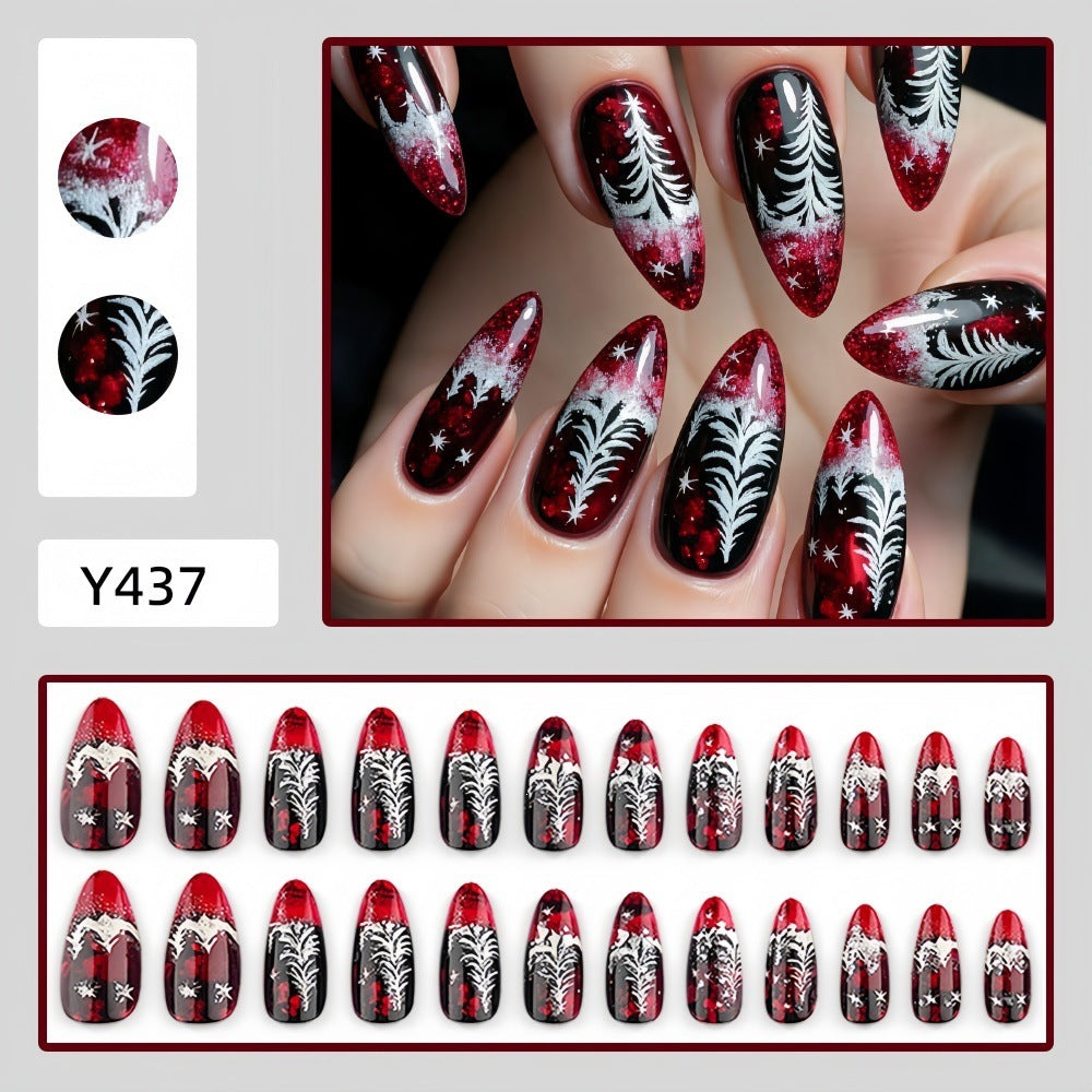Artificial nails in festive Christmas design with elegant glitter Stornfield