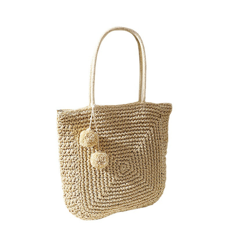 Handmade straw bag with pompom details Stornfield