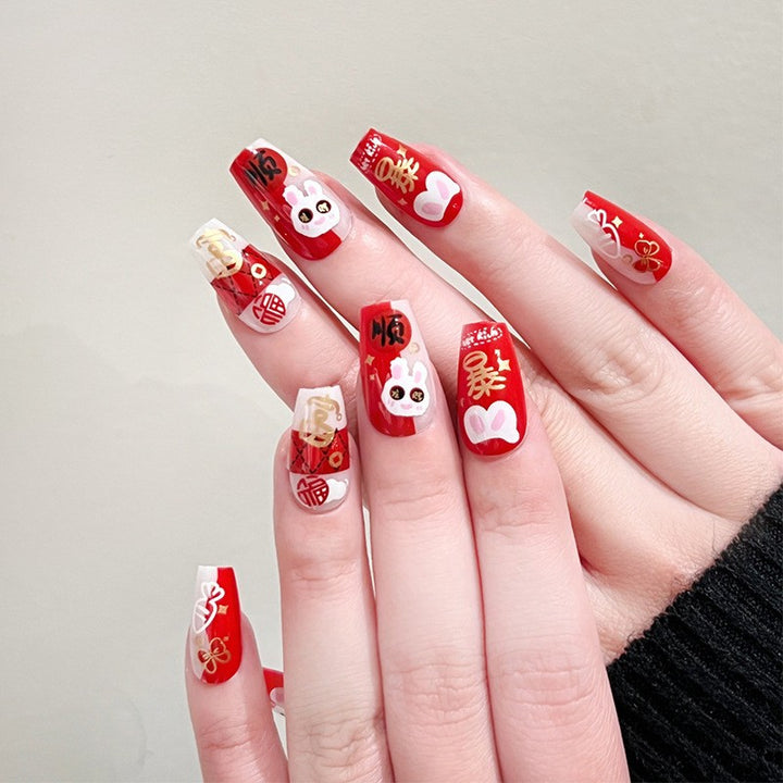 Artful nail extensions with an elegant leaf pattern Stornfield