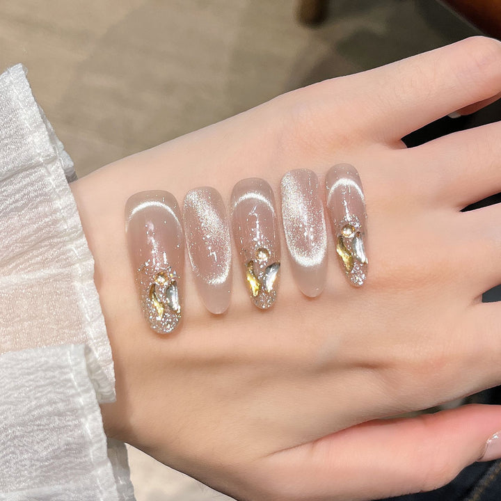 Elegant Nail Art Extensions with Pearl Accents Stornfield