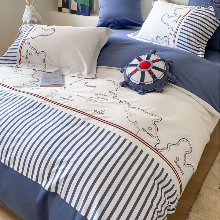 Maritime children's duvet cover set with cartographic print, fine striped border and pillowcases