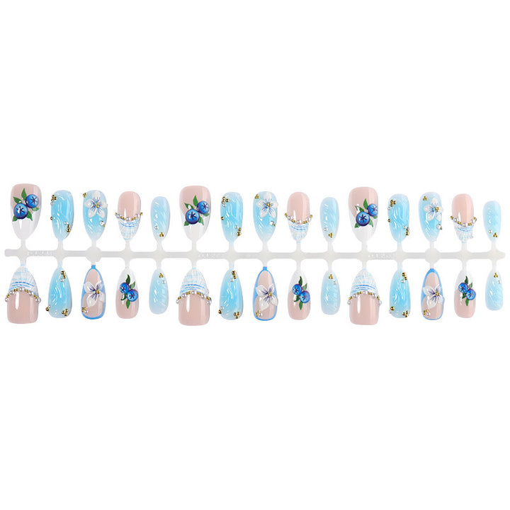Artificial nail set with floral accents and sparkling details Stornfield