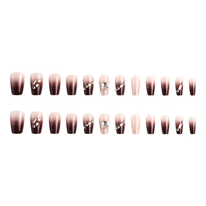 Artificials nails with glitter embellishments and elegant accents Stornfield