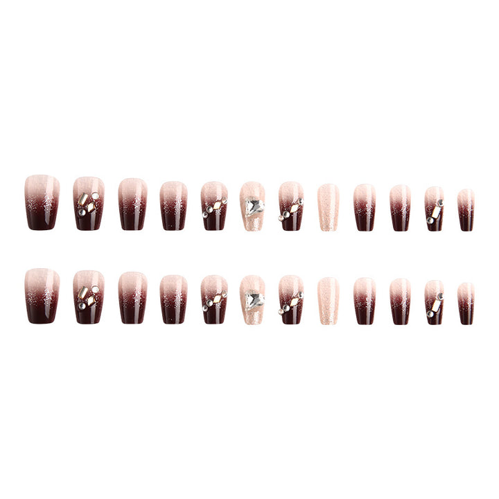 Artificials nails with glitter embellishments and elegant accents Stornfield