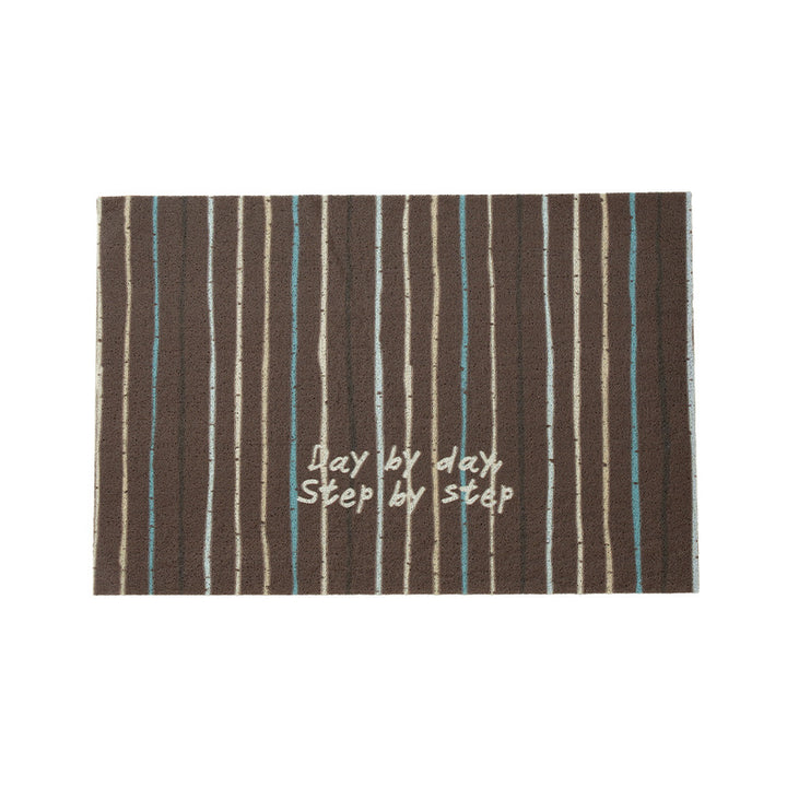 Durable entrance doormat with striped texture and "Welcome" lettering Stornfield