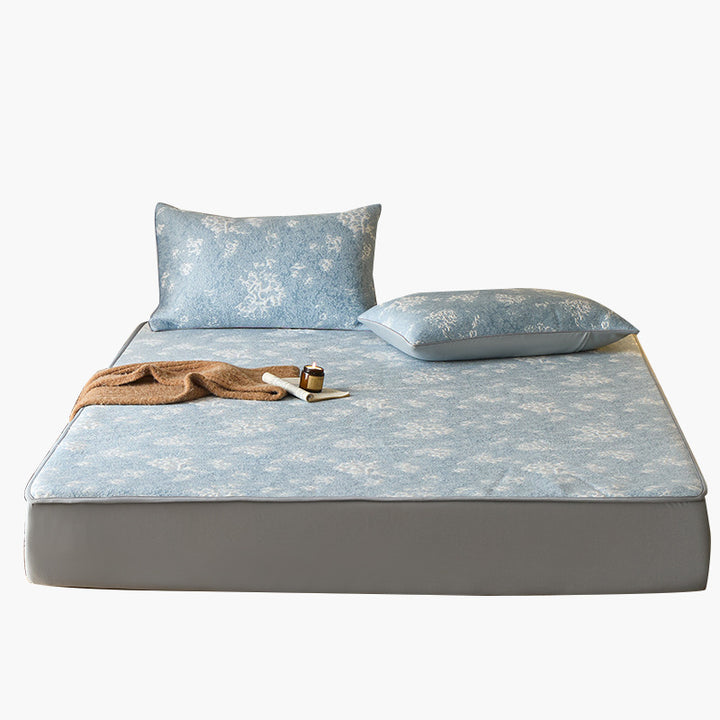 Quilted microfiber mattress pad with non-slip bottom and floral jacquard surface