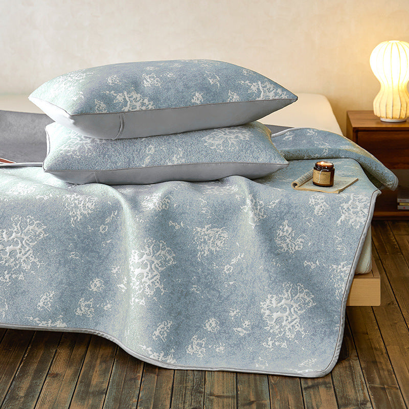 Quilted microfiber mattress pad with non-slip bottom and floral jacquard surface