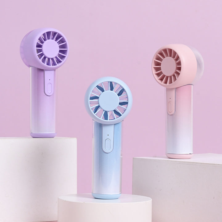 Unisex nano compact portable handheld fan rechargeable via USB with quiet operation and ergonomic grip Stornfield