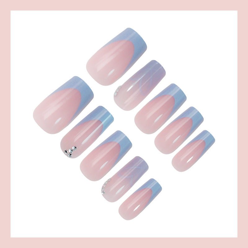 Artificial nail set with romantic heart designs and glamorous accents Stornfield