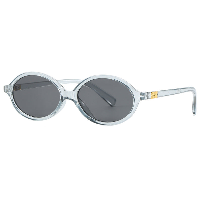 Women's fashionable sunglasses with oval frame and golden accents Stornfield