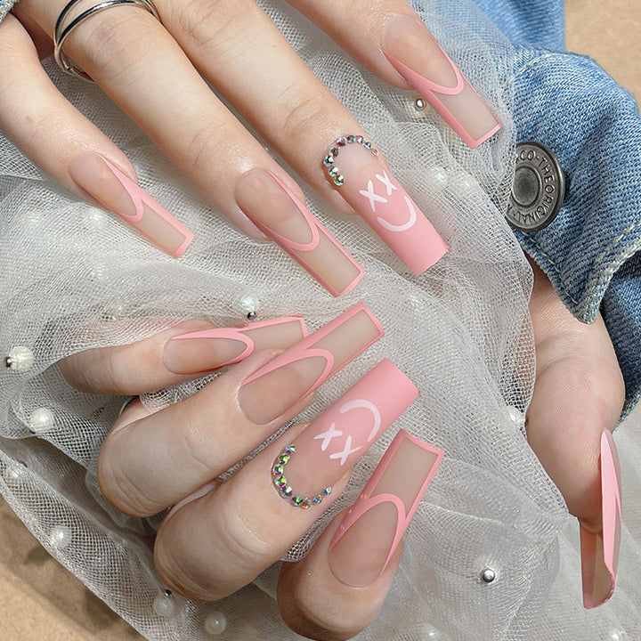 Decorative Press-On Nail Set with Playful Designs Stornfield