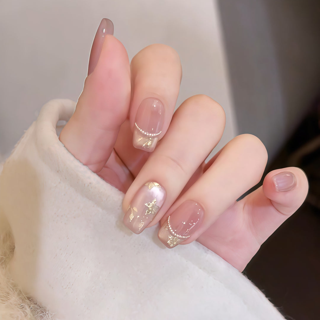 Artificial nails with elegant gold designs Stornfield