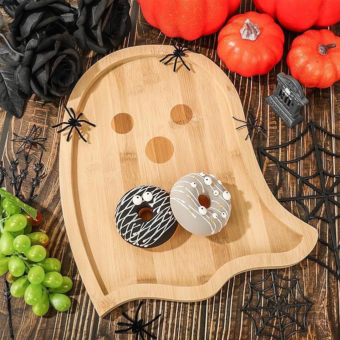 Halloween serving plates made of wood set with pumpkin and ghost shapes