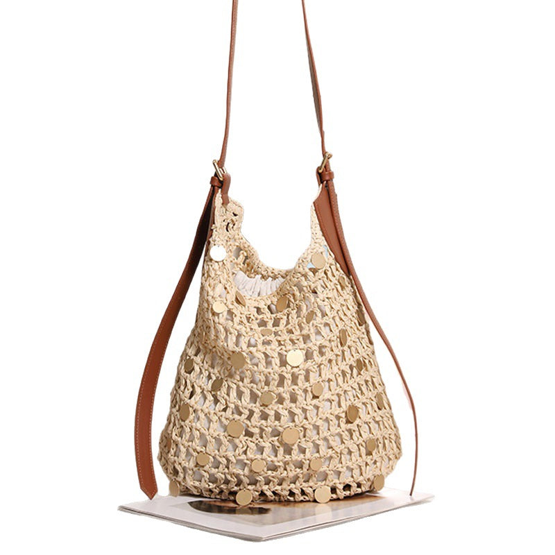 Hand-knotted shoulder bag with metal appliqués Stornfield